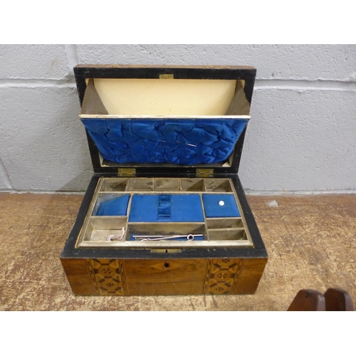 1111 - An inlaid sewing box and a wooden measure