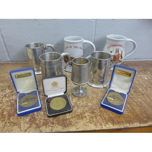 1112 - A collection of rowing related items including tankards and medals