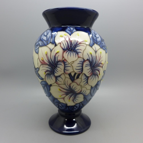 605 - A Moorcroft vase, signed, 18cm