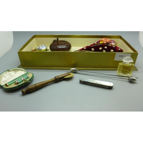 635 - A Lalique perfume, a silver spoon, Caithness letter opener, cased cigarette holder and lighter, snuf... 