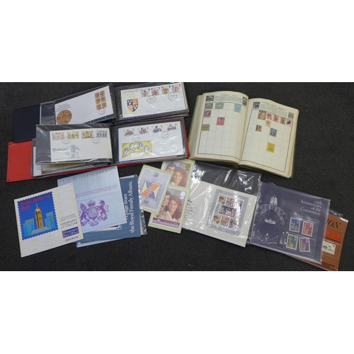 662 - Two folders of first day covers, a stamp album and other stamps