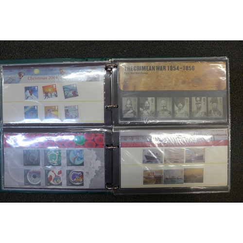 665 - Stamps;-GB presentation packs in album (40), (face value in excess of £170)