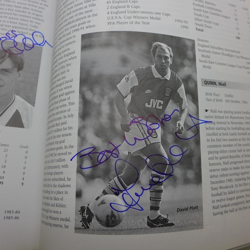 668 - Football; a copy of Arsenal Who's Who containing over 30 signatures from former players including Jo... 