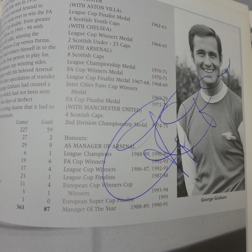 668 - Football; a copy of Arsenal Who's Who containing over 30 signatures from former players including Jo... 