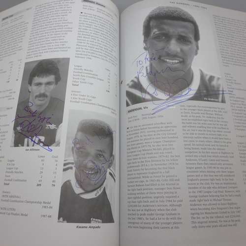 668 - Football; a copy of Arsenal Who's Who containing over 30 signatures from former players including Jo... 