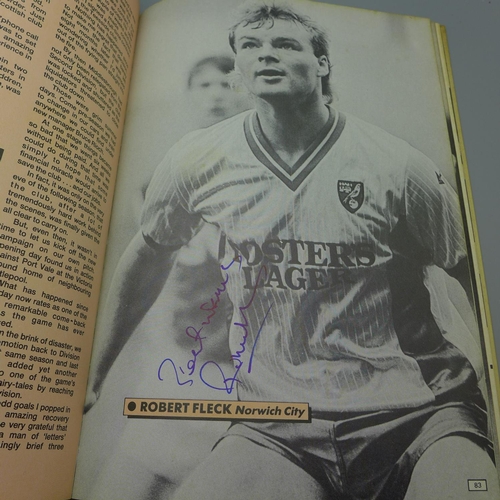 669 - Football; A copy of the Topical Times football book 1989 containing several signatures from former f... 