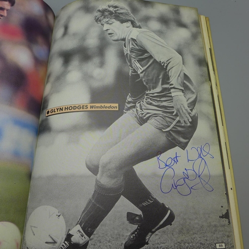 669 - Football; A copy of the Topical Times football book 1989 containing several signatures from former f... 