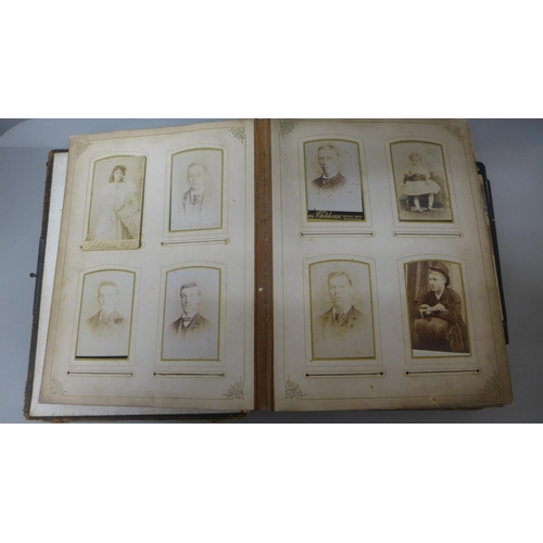 673 - A carte-de-visite album, a/f, containing some cards