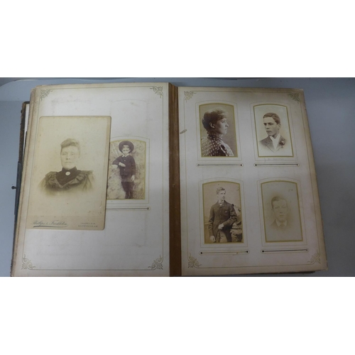 673 - A carte-de-visite album, a/f, containing some cards