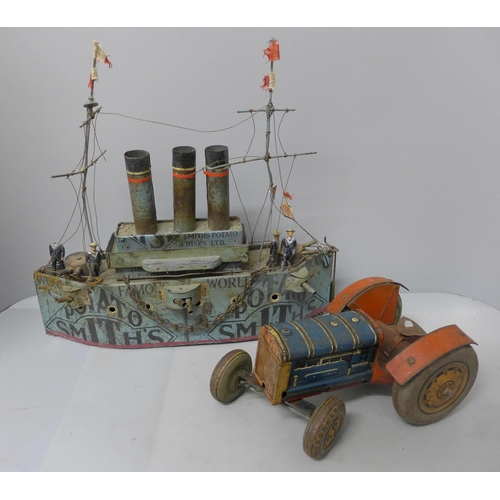 674 - An early 20th century hand-built model dreadnought battleship (length 38cm) made from 1920s Smiths P... 