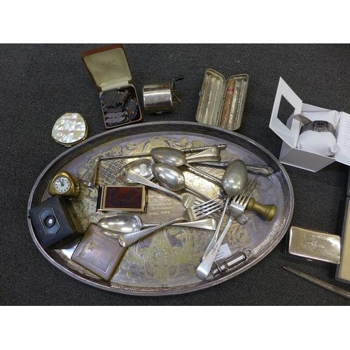 676 - Assorted items; a small clock, a camera, a compact, a whistle, a cigar case, etc.