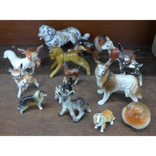 677 - A collection of animal figures including a Beswick calf, some a/f