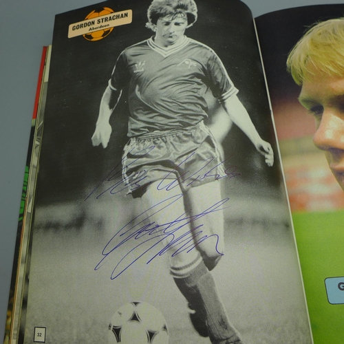 682 - Football; a copy of the Topical Times football book 1983 containing several signatures from former f... 