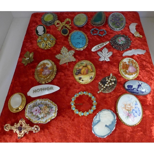 738 - A collection of costume brooches