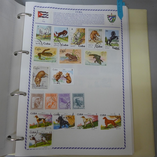 749 - Stamps;-Philatelia album with GB and World stamps (wildlife themed) and box with GB ‘kiloware’ and p... 