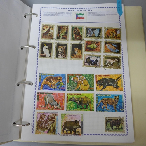 749 - Stamps;-Philatelia album with GB and World stamps (wildlife themed) and box with GB ‘kiloware’ and p... 