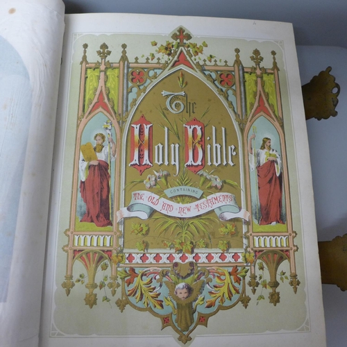 754 - A large Holy Bible, edited by Rev. John Eadie, with color plates, tooled cover, gilt metal corners a... 