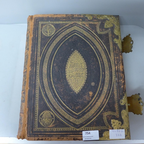 754 - A large Holy Bible, edited by Rev. John Eadie, with color plates, tooled cover, gilt metal corners a... 