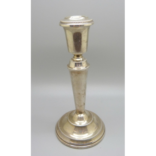 812 - A silver candlestick, Birmingham 1977, 17.5cm, (stem slightly out of shape)