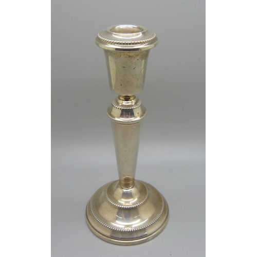 812 - A silver candlestick, Birmingham 1977, 17.5cm, (stem slightly out of shape)