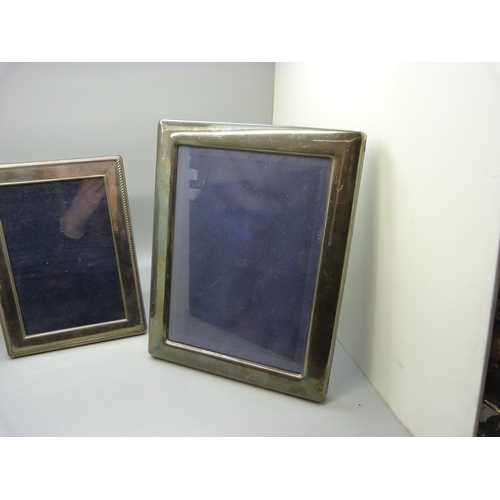 821 - Three silver photograph frames, largest 17cm x 22cm