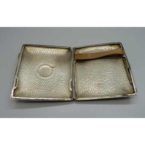 823 - A hammered silver cigarette case, with monogram, Birmingham 1908, 97g, 70mm x 83mm