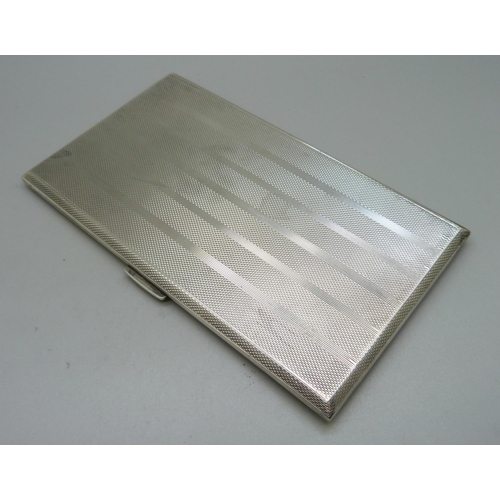 827 - A large silver cigarette case, 242g, 85mm x 150mm