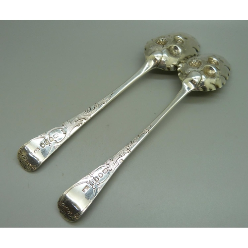 829 - Two similar George III silver berry spoons, London 1794 and 1799, 116g