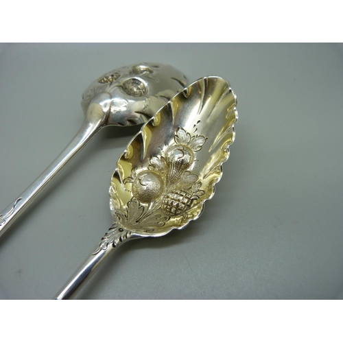 829 - Two similar George III silver berry spoons, London 1794 and 1799, 116g