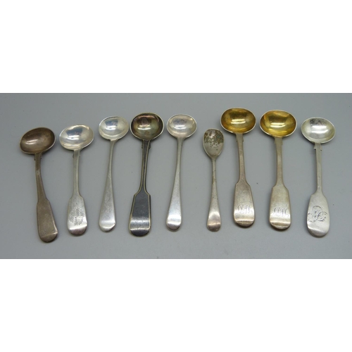 834 - A collection of eight silver condiment spoons, 90g, and a plated mustard spoon