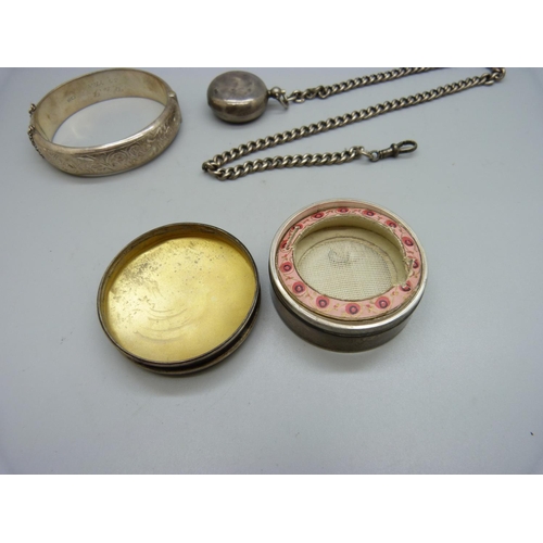 846 - A silver chain with metal clip, a silver sovereign case, a circular silver box and a silver bangle, ... 