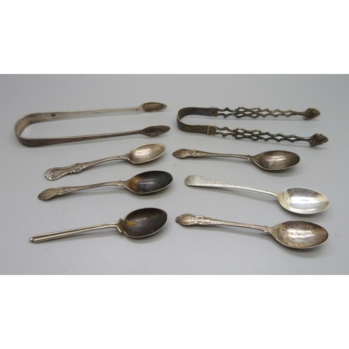 848 - Six silver spoons and two pairs of silver sugar bows, 138g