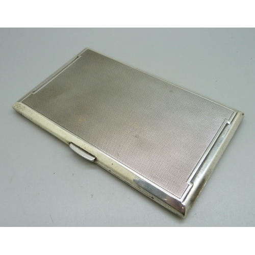 857 - A large silver Art Deco cigarette case, Birmingham 1942, inner case bears inscription, 218g