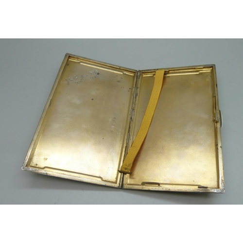 857 - A large silver Art Deco cigarette case, Birmingham 1942, inner case bears inscription, 218g