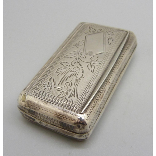 858 - A white metal snuff box, the top with bird detail, with diamond shaped control mark, 58mm wide