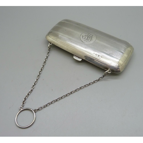 860 - A silver purse with monogram, Birmingham 1918, 83g, 113mm