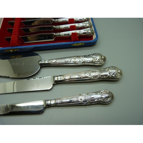 861 - Two silver handled knives, a cake server and a set of six knives