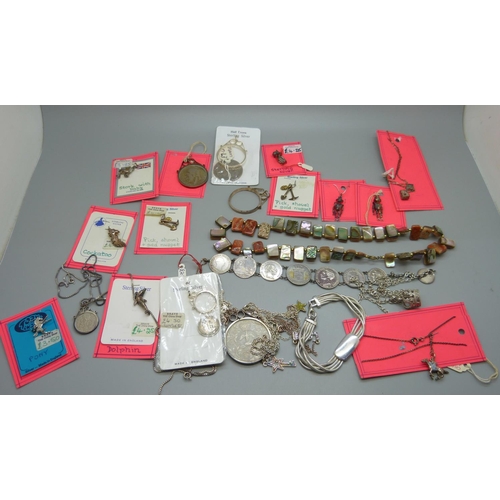 872 - Silver charms, silver chains, etc., and a mother of pearl necklace