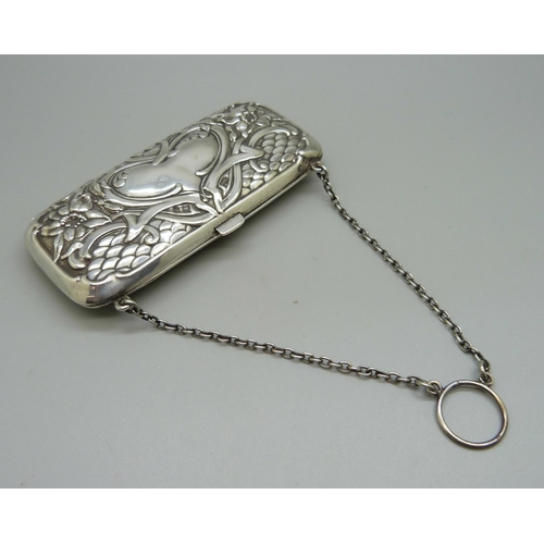 874 - An Edwardian art Nouveau silver purse, Birmingham 1907, 75g, 113mm