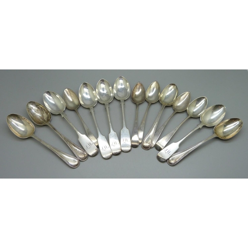 877 - Fourteen silver spoons, 276g