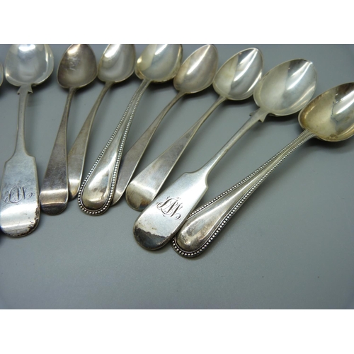 877 - Fourteen silver spoons, 276g