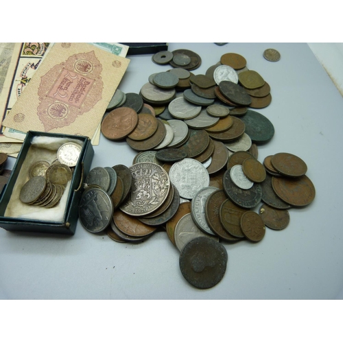 883 - A collection of coins and banknotes