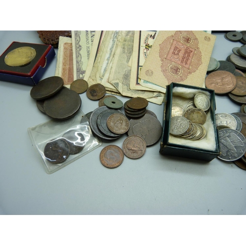 883 - A collection of coins and banknotes