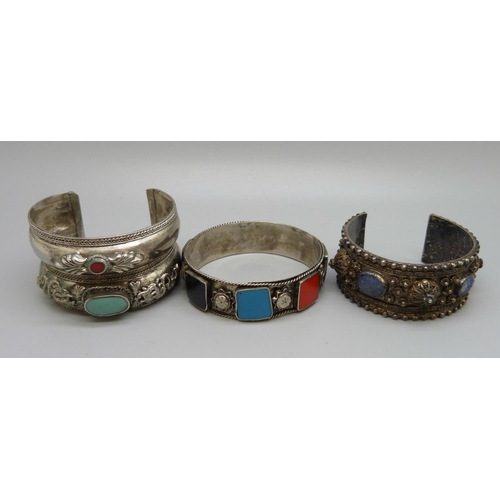 893 - Three white metal/silver bangles