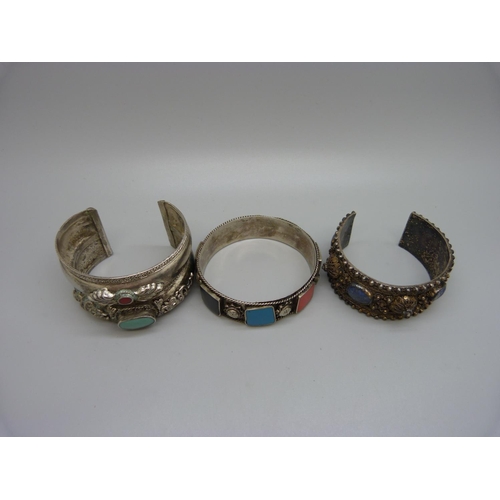 893 - Three white metal/silver bangles