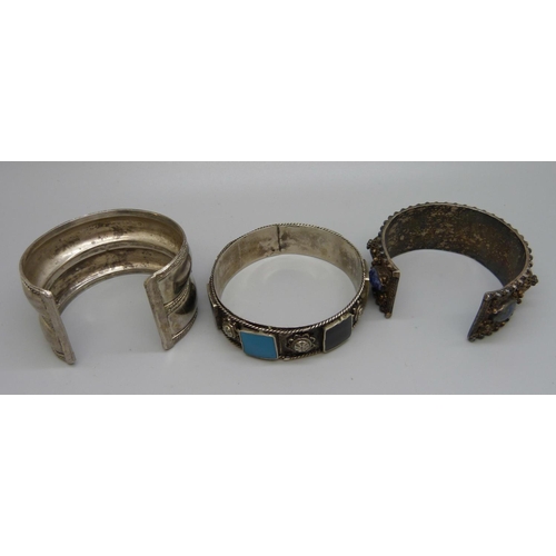 893 - Three white metal/silver bangles