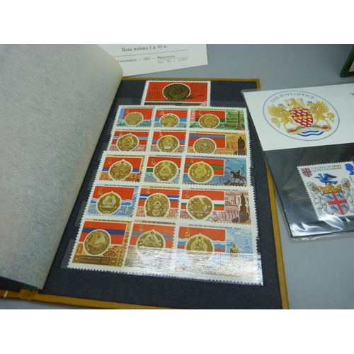 914 - A collection of stamps,  mainly Soviet era Russian stamps