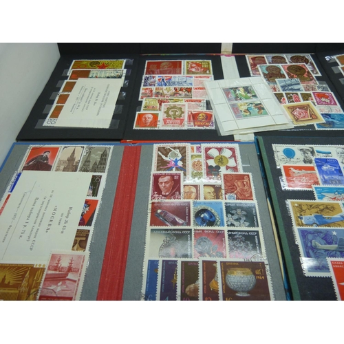 914 - A collection of stamps,  mainly Soviet era Russian stamps