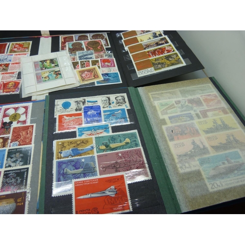 914 - A collection of stamps,  mainly Soviet era Russian stamps