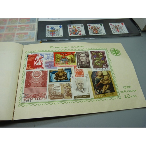 914 - A collection of stamps,  mainly Soviet era Russian stamps